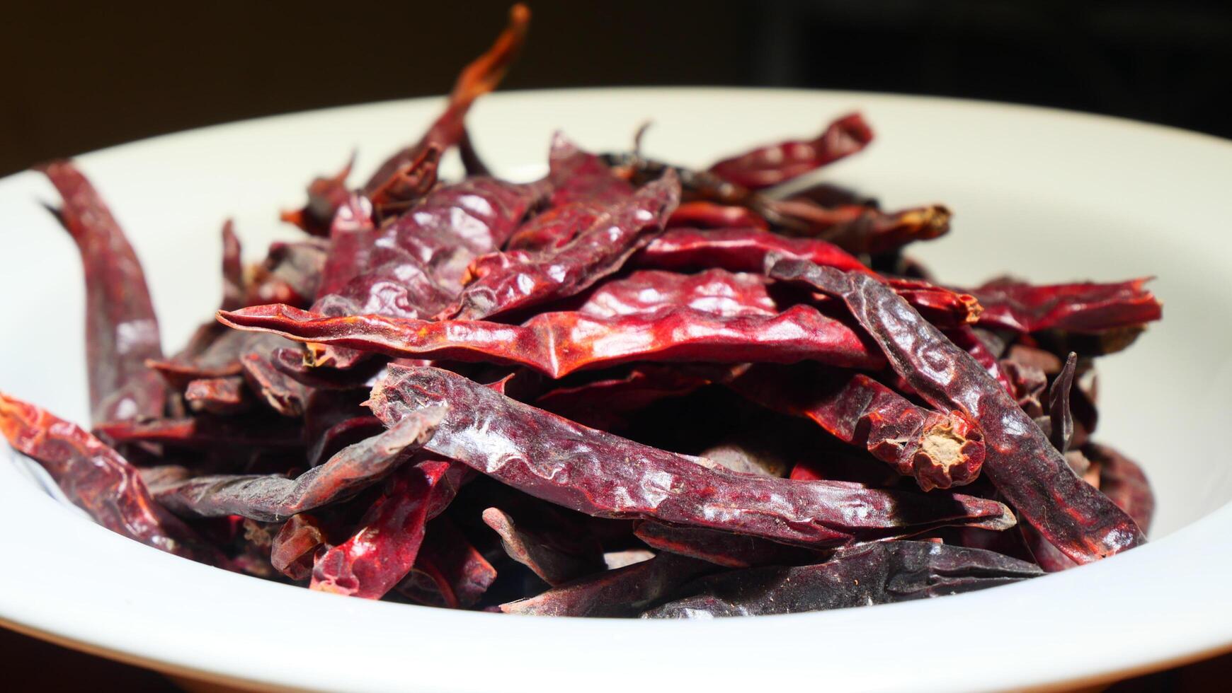 Dried red and dark chilies, a key ingredient in Asian cooking photo