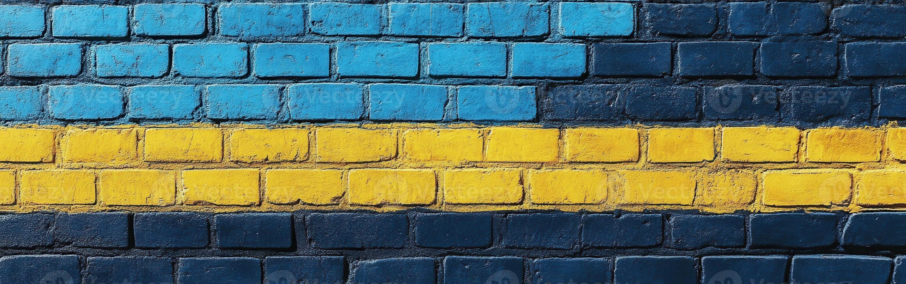 A brick wall painted with the colors of the ukraine flag photo
