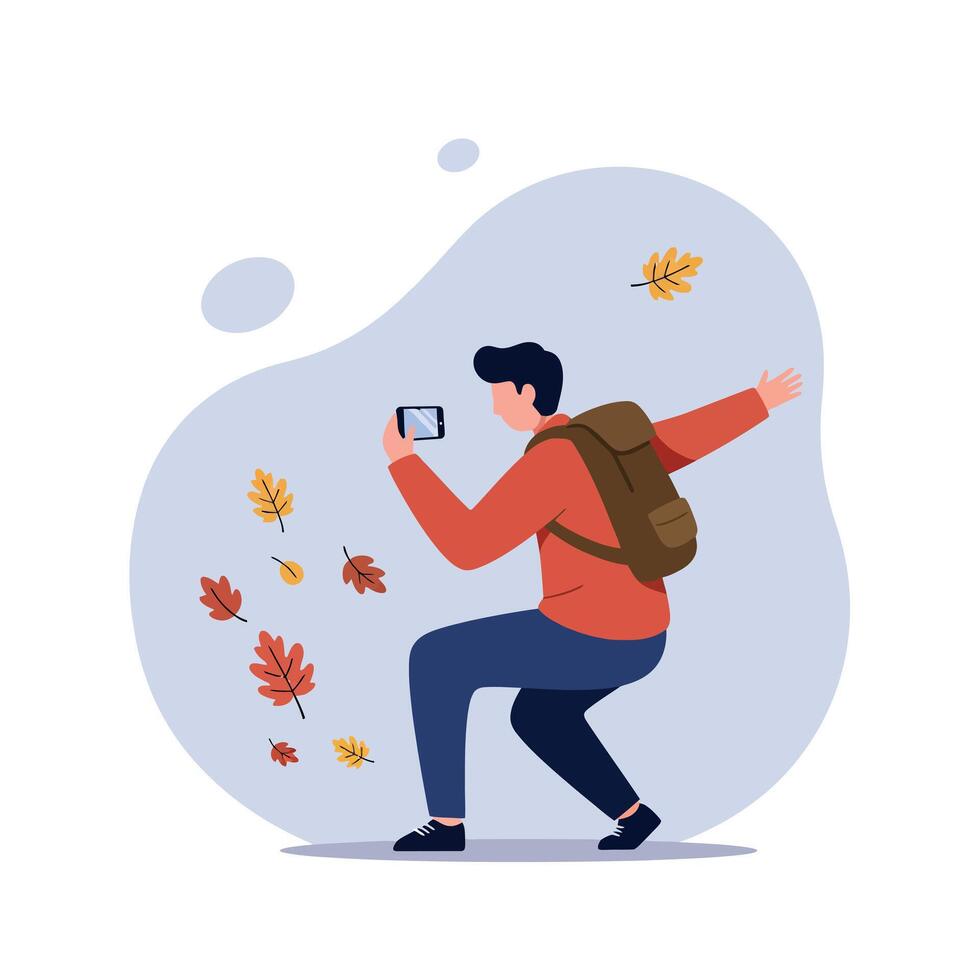 Young man capturing falling autumn leaves with smartphone in casual outfit flat design illustration vector