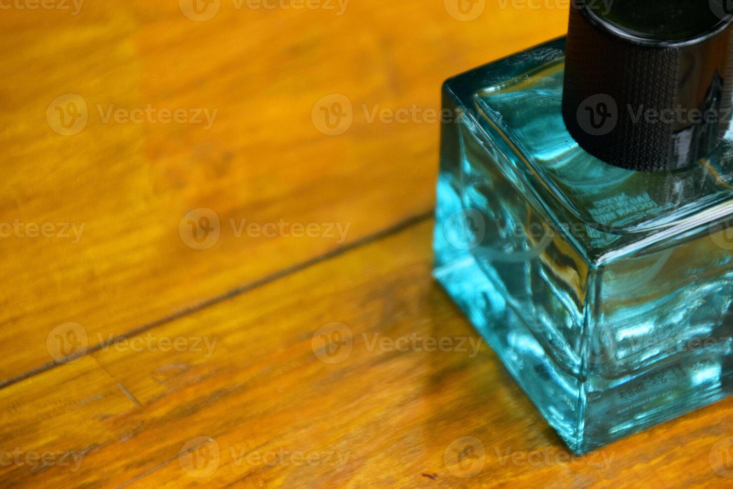 Stylish Perfume on Rustic Wooden Surface Closeup photo