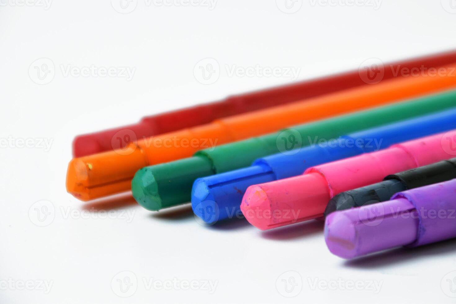 Multicolor Silky Crayons Displayed on White Background photo