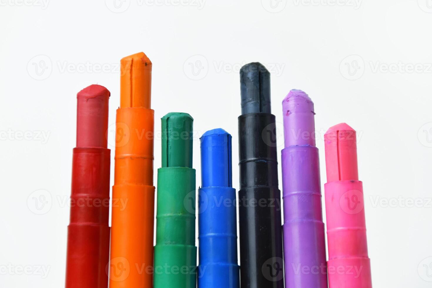 A Colorful silky crayons on white background photo