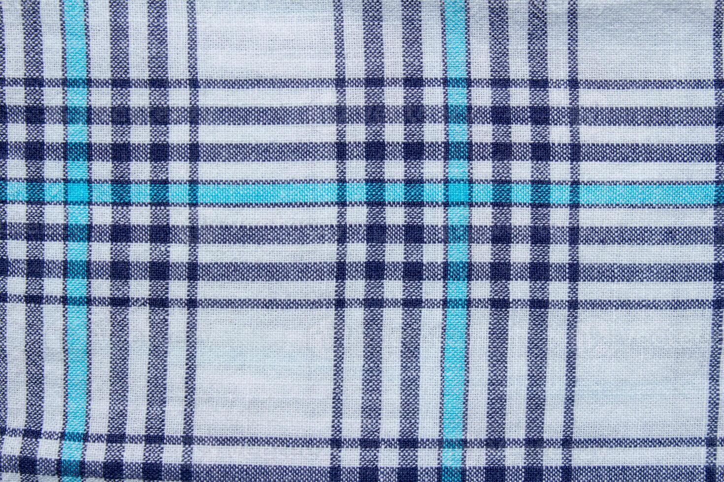 Classic blue and cyan plaid fabric texture background photo