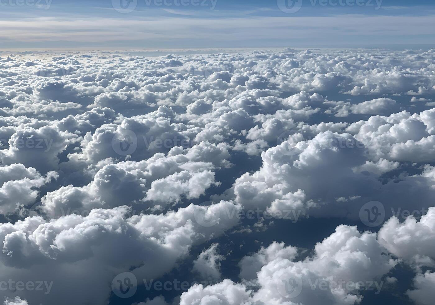 Aerial View of Cumulus Cloudscape Endless White Clouds from Above photo