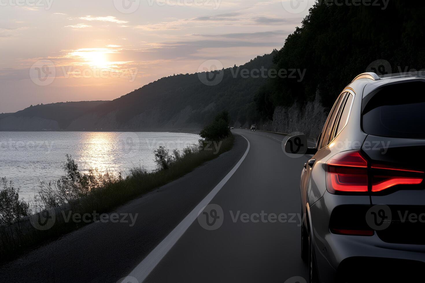 Scenic Sunset Drive Luxury SUV on Coastal Highway photo