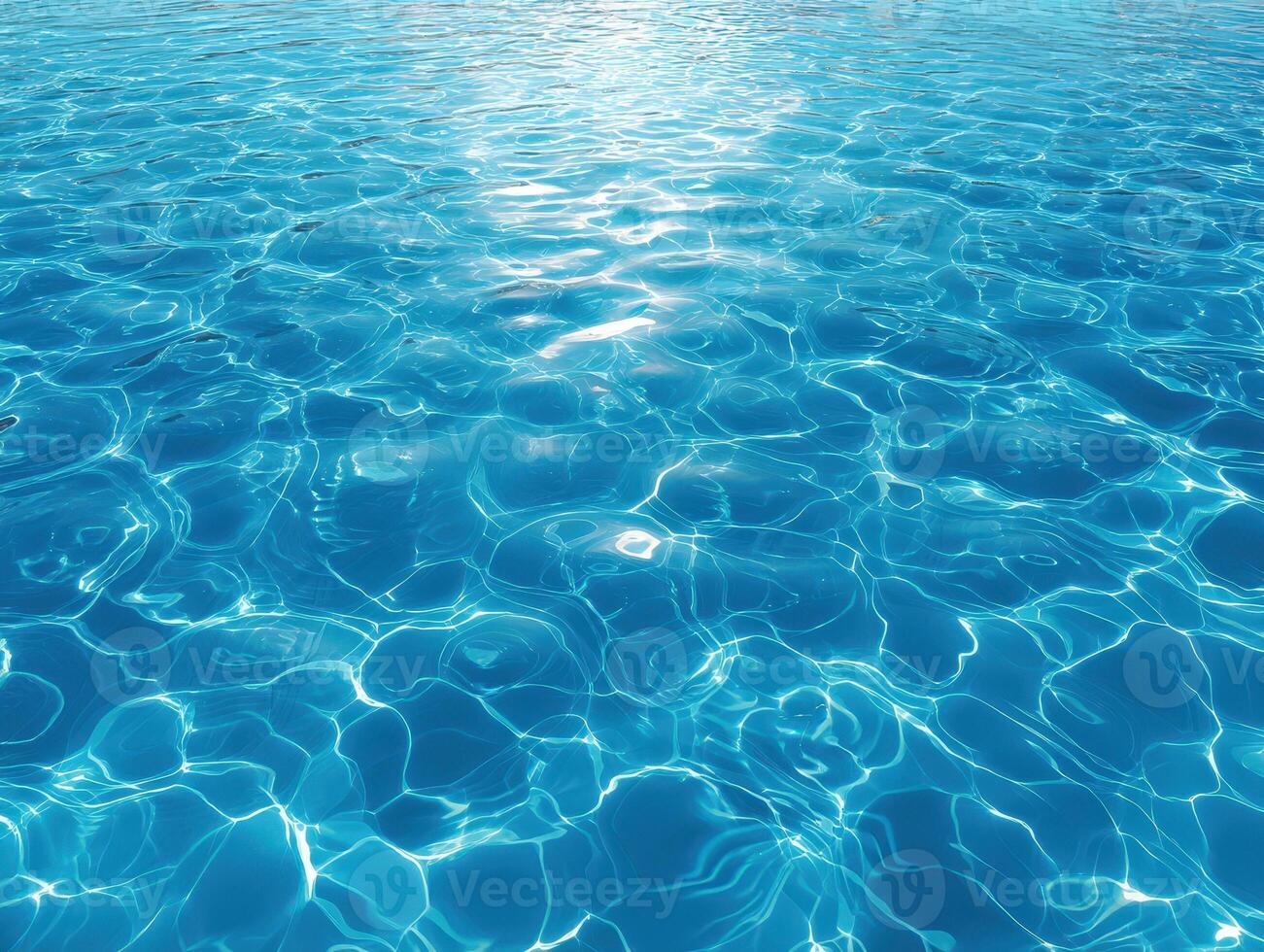 Rippling turquoise water with sunlight reflecting off the surface, creating intricate patterns and a sense of peacefulness and tranquility photo