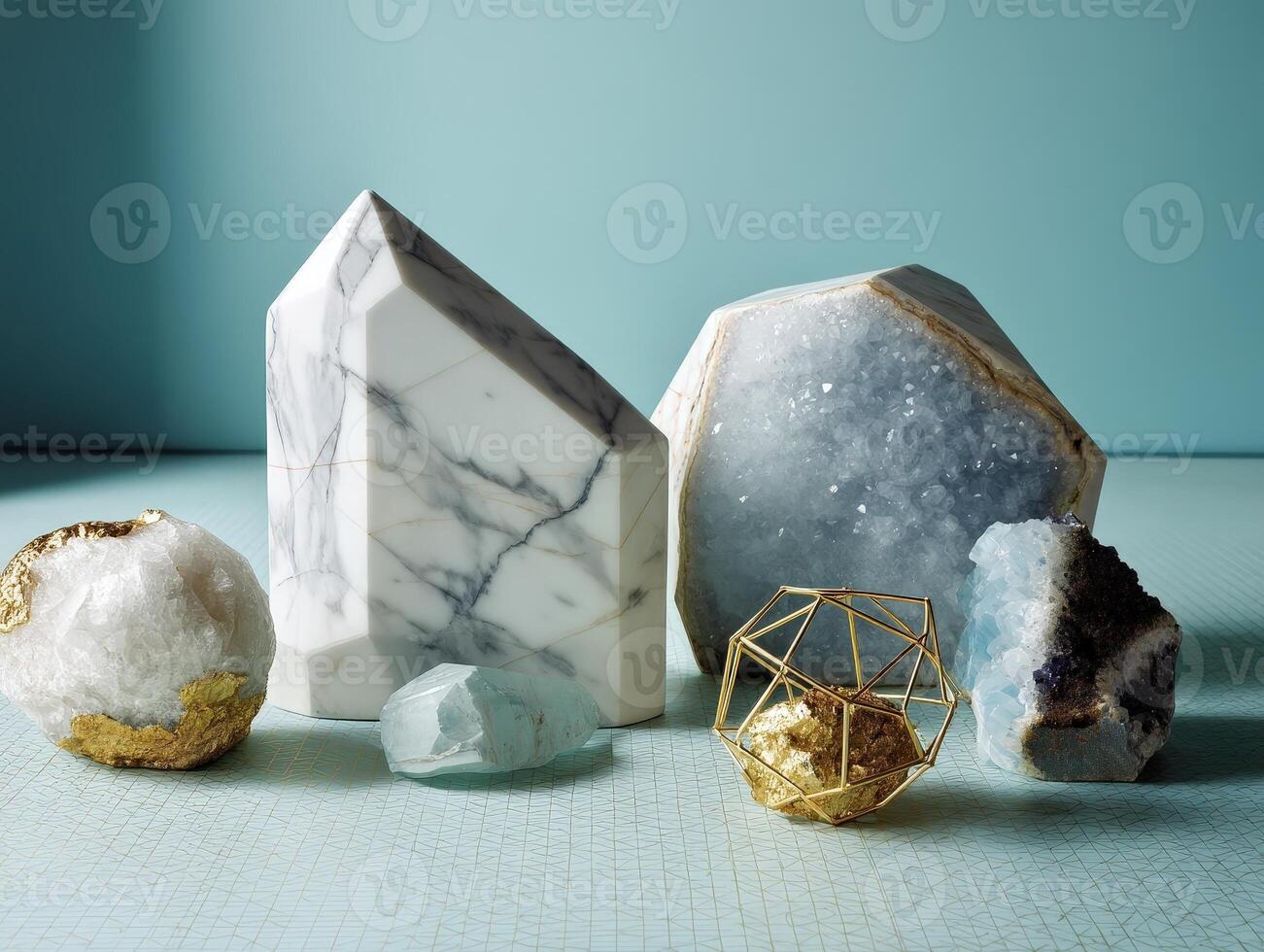 Six minerals and a gold geometric sculpture are artfully arranged. Included are white marbled stone, blue crystal geode, rough quartz, and an angular glass-like mineral photo