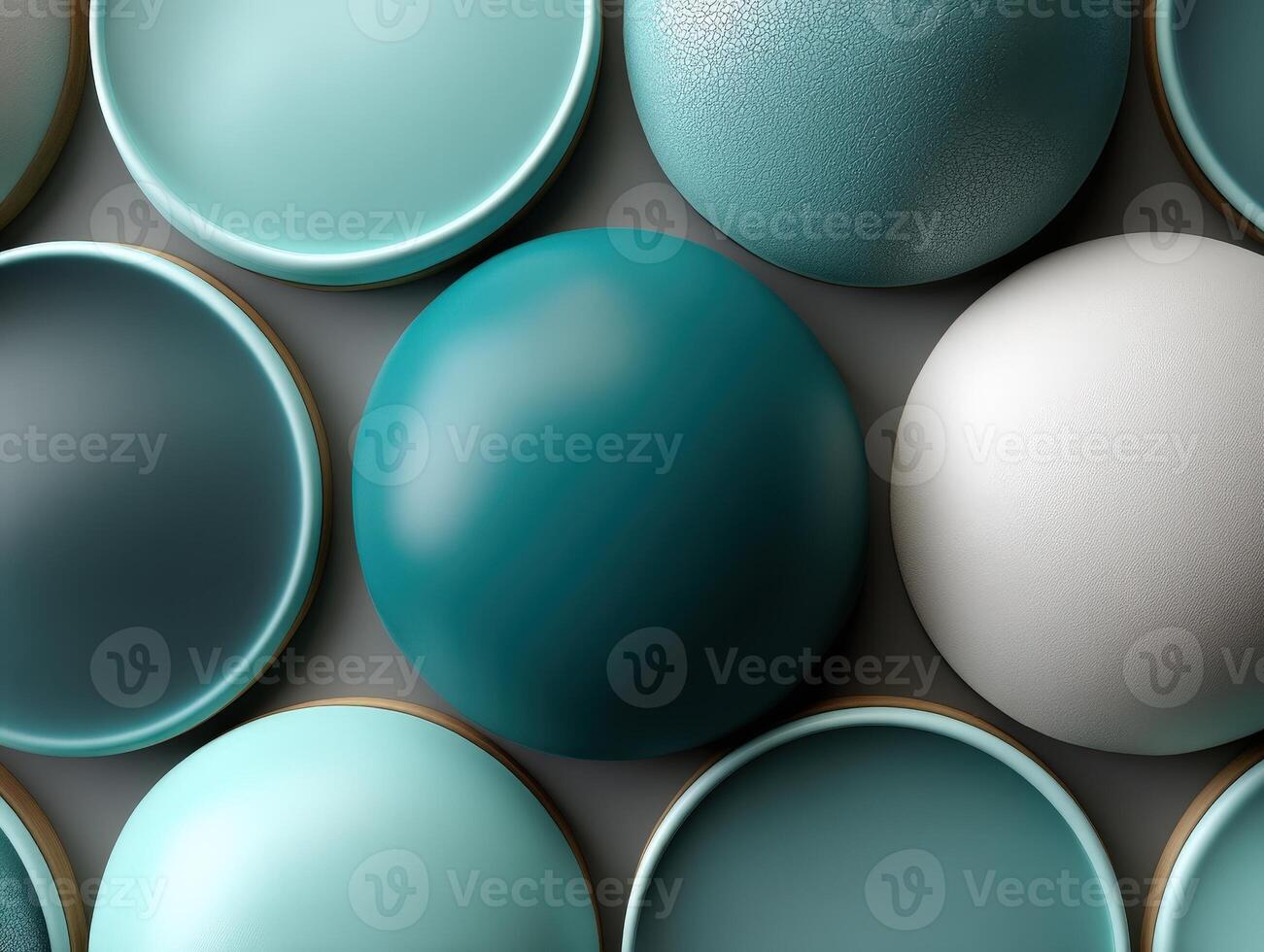 Circular objects in shades of teal and white are arranged in a grid pattern. Smooth and textured surfaces create a visually appealing composition emphasizing contrast photo