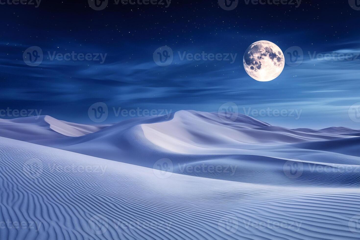Full moon illuminating white sand dunes in desert at night photo