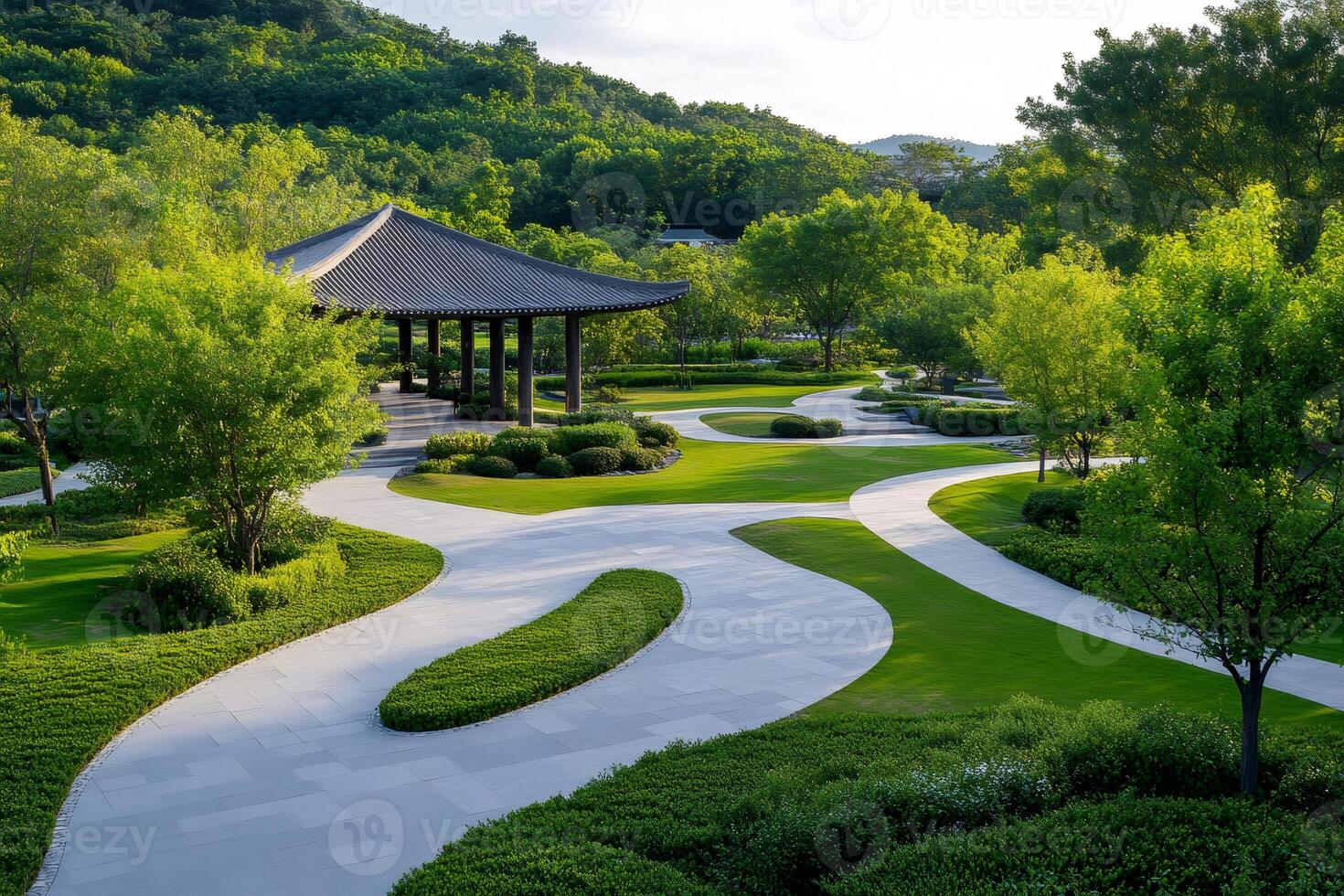 Serene landscape design showcasing winding pathways amidst vibrant greenery and a peaceful pavilion photo