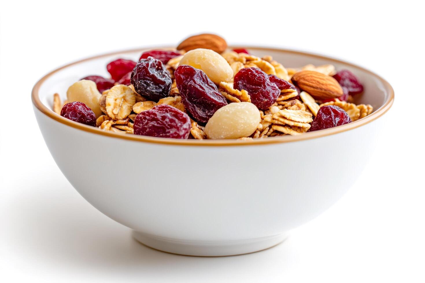 Bowl of granola with dried cranberries, almonds and macadamia nuts over white background photo