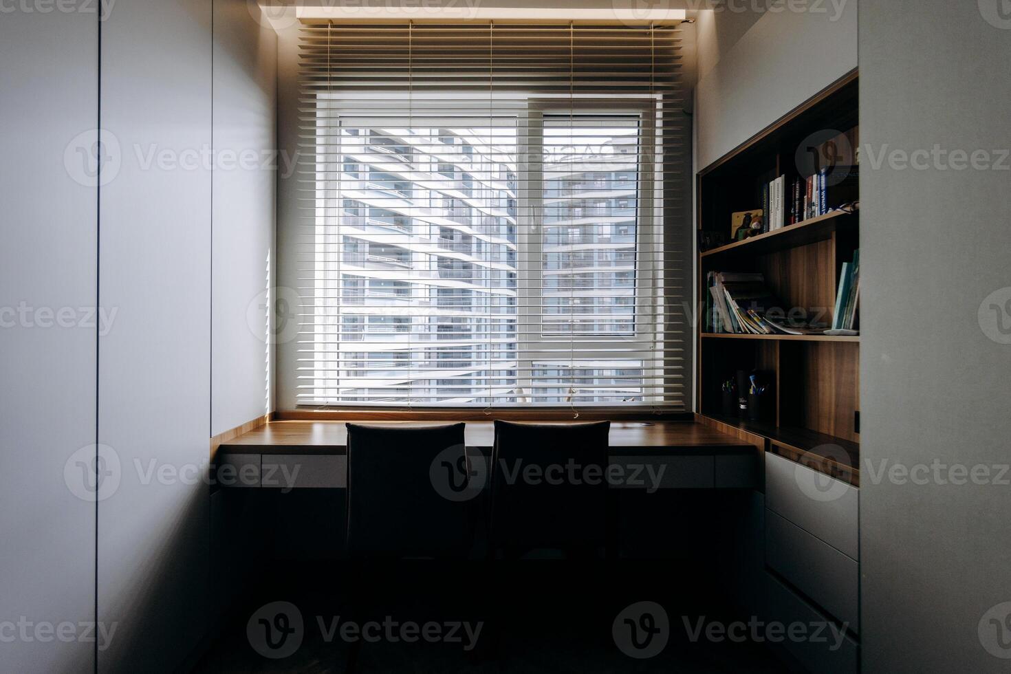 A minimalistic workspace featuring a stunning modern window view that enhances productivity photo