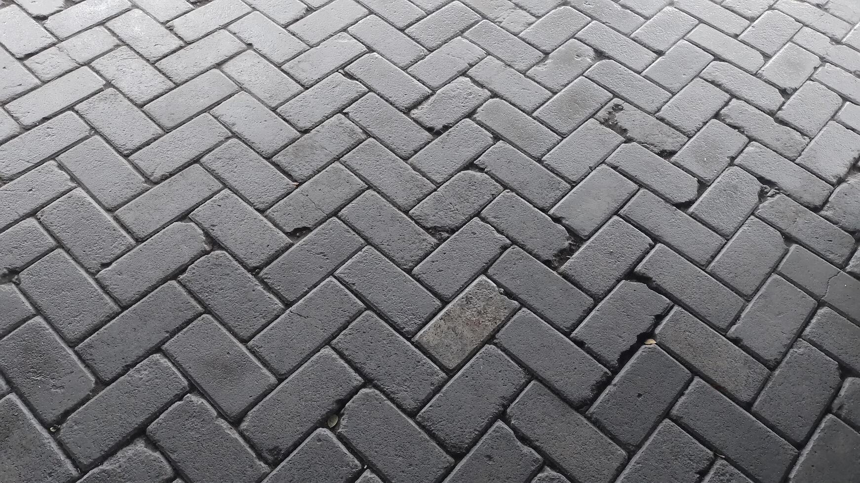 Square tile pattern repeated in gray color for background design. photo