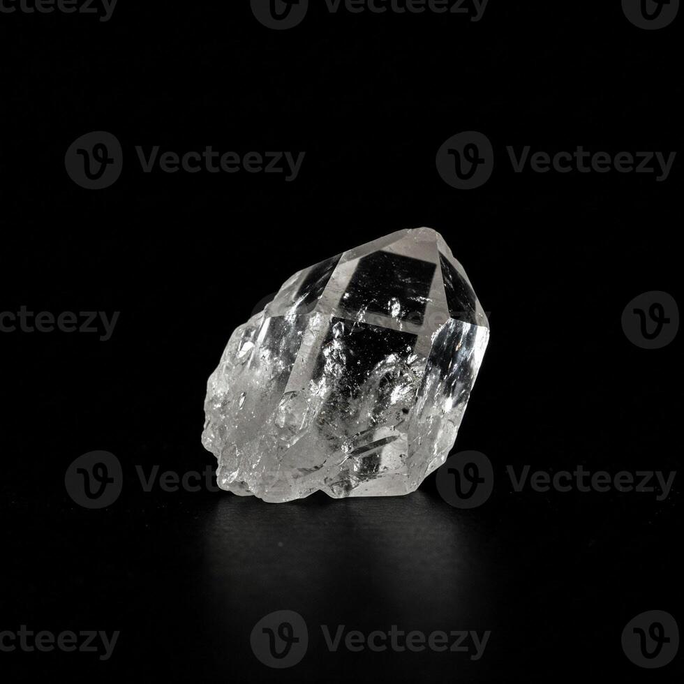 A large crystal on a black background photo