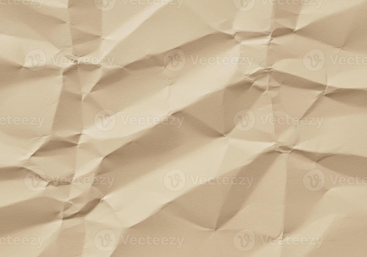 Textured Beige Crumpled Paper Background with Subtle Shadows for Graphic Design photo