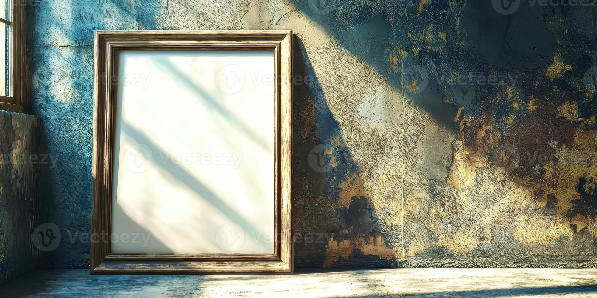 An empty frame in an old room with a sun shining through the window photo