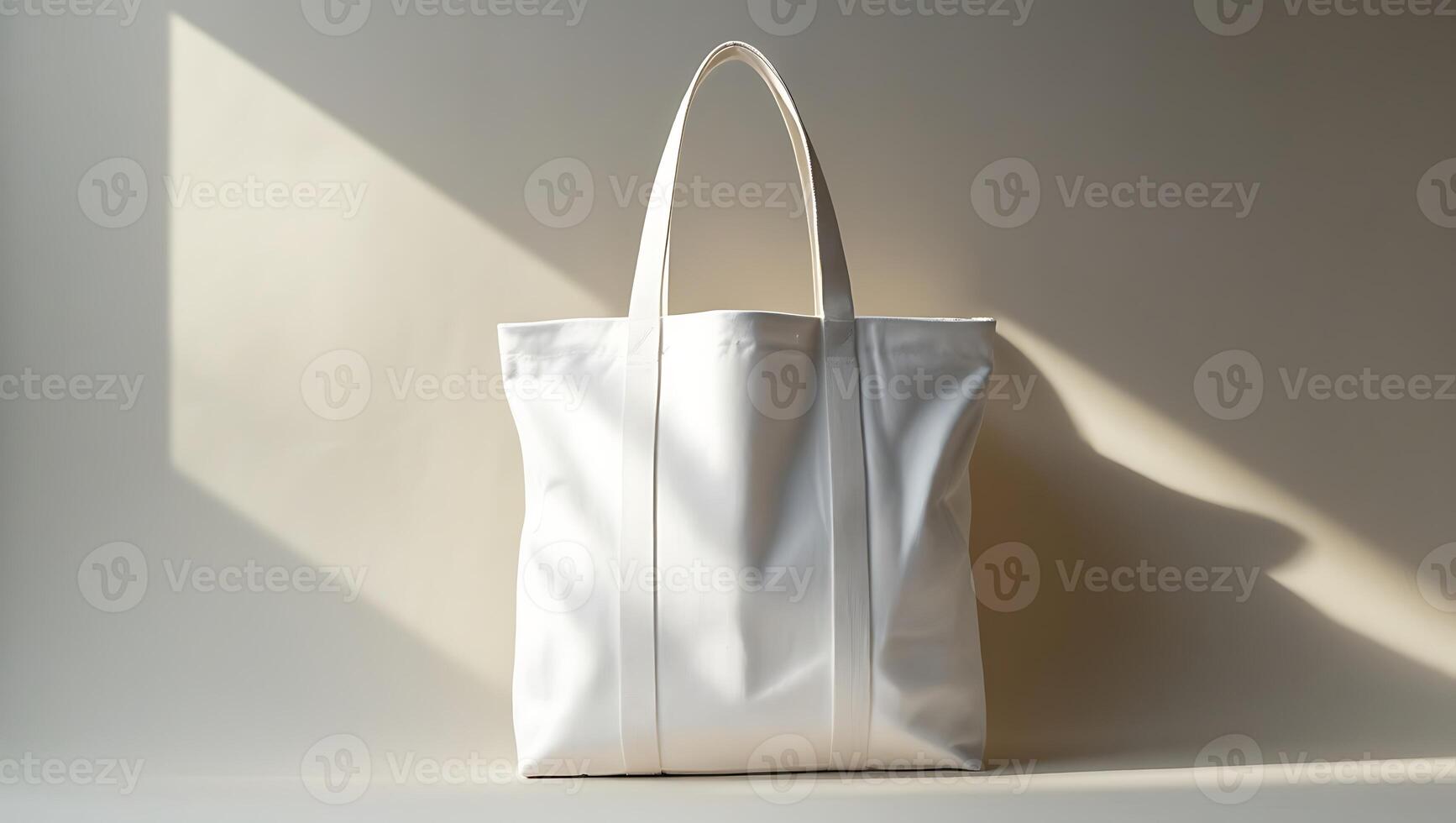 Minimalist white canvas tote bag, studio photography, soft lighting, neutral background, clean design, eco-friendly, reusable shopping bag, simple elegance, monochromatic, textured fabric, durable han photo