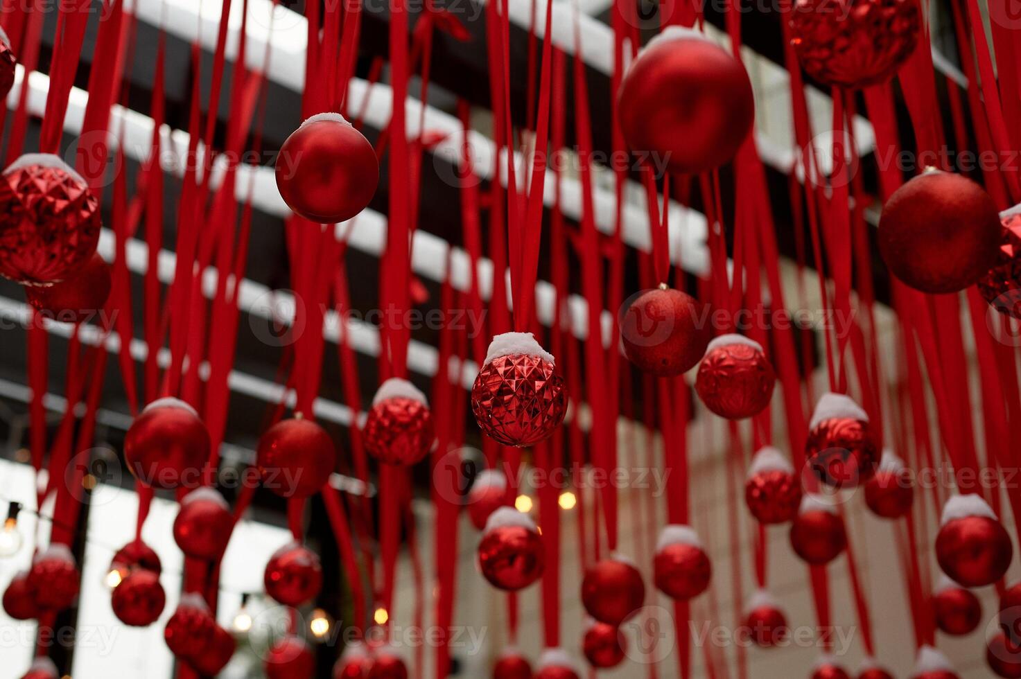 A lot of red balloons, New Year's street decoration. On ribbons. New Year holidays photo