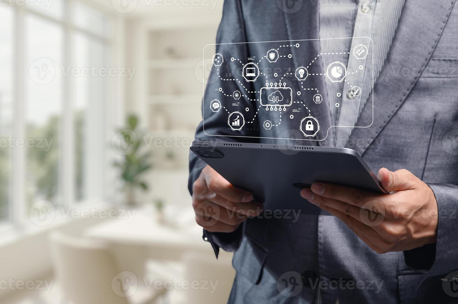 Businessman Using Tablet with Digital Technology Interface in Office photo