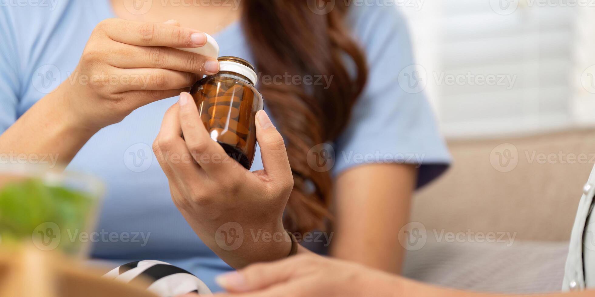Wellness and Supplements. A mother discusses vitamins with her child, fostering an interest in health and well-being. photo