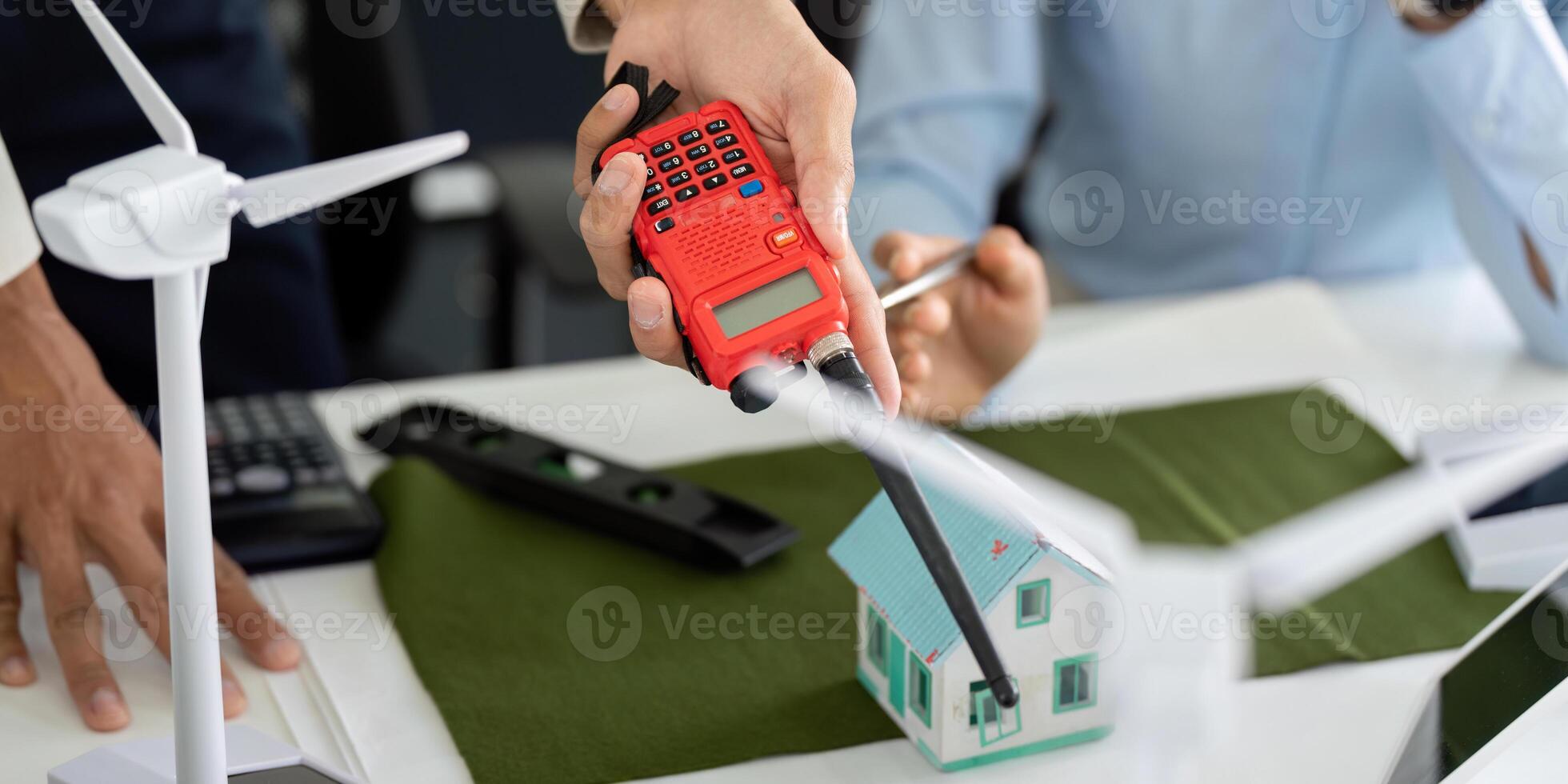Tools for Sustainable Building Assessment. A professional demonstrating a measurement device for eco-friendly construction. photo