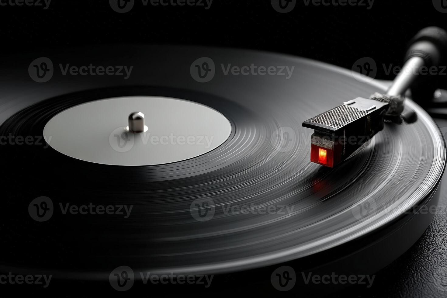 Vinyl record spins on a turntable in a dimly lit room creating a nostalgic atmosphere photo