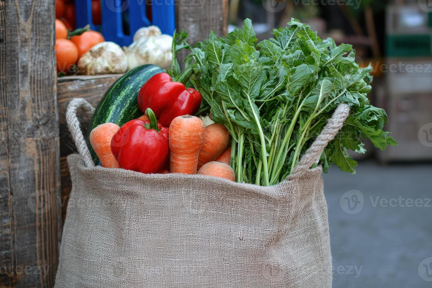 Fresh vegetables in a burlap sack displayed at a local market in the afternoon sunlight photo