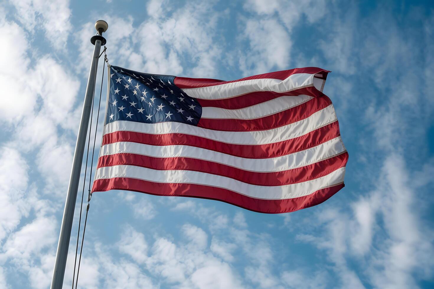 An american flag is flying in the wind photo