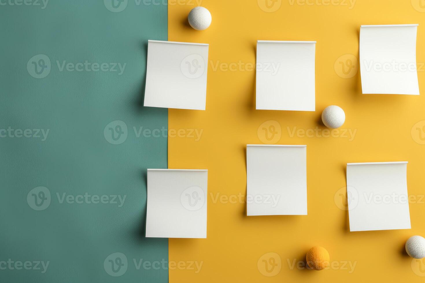 A yellow and green background with white sticky notes on it photo