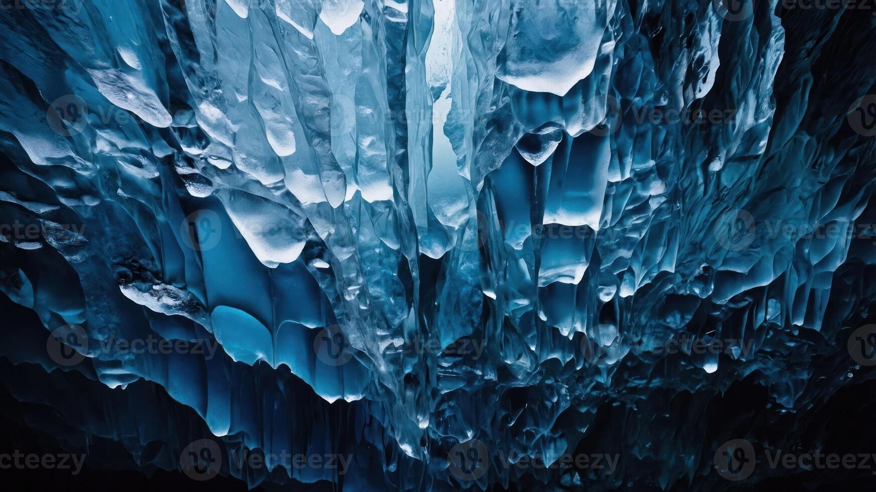 Stunning ice cave ceiling showcasing intricate formations and ethereal blue lighting. photo