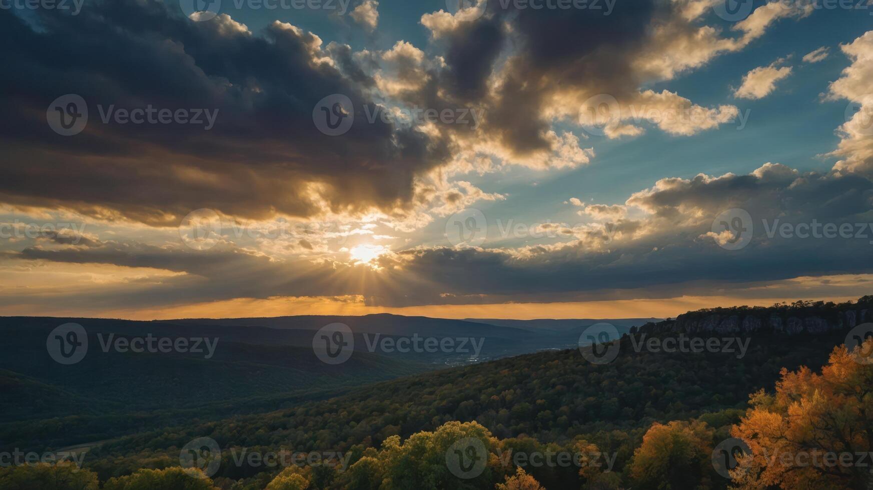 A serene sunset over rolling hills, with rays of light breaking through clouds, highlighting autumn foliage. photo