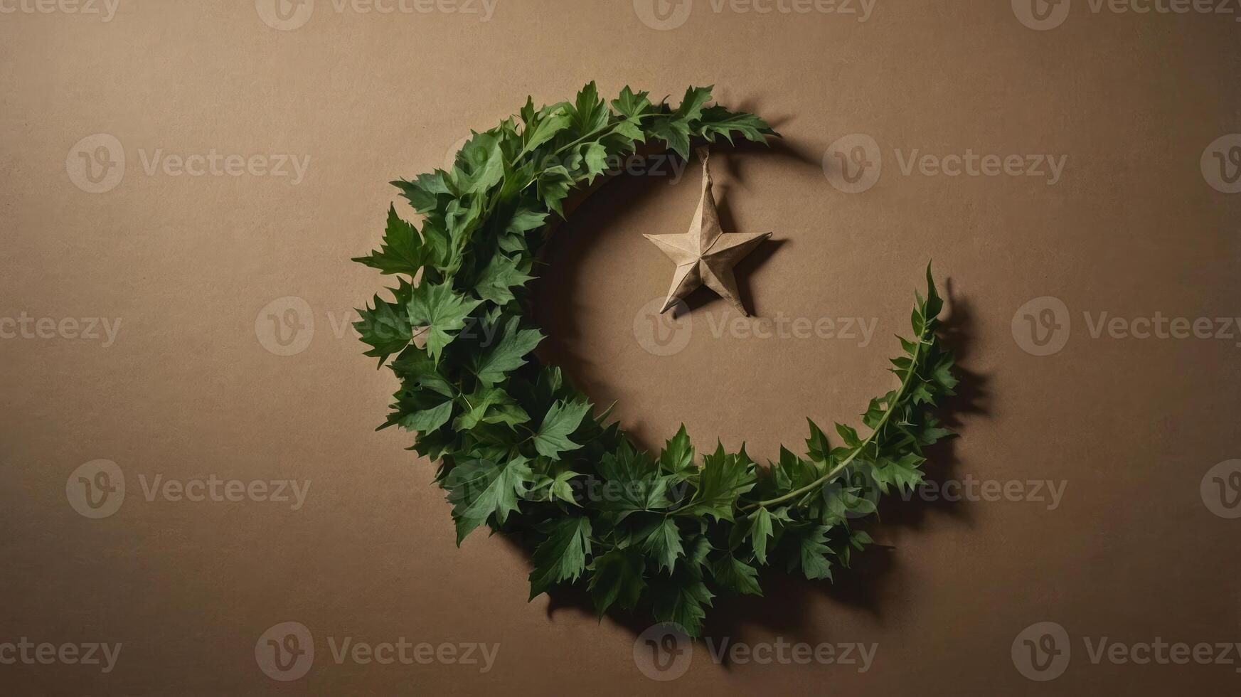 A crescent moon made of leaves with a star, symbolizing nature and celebration. photo