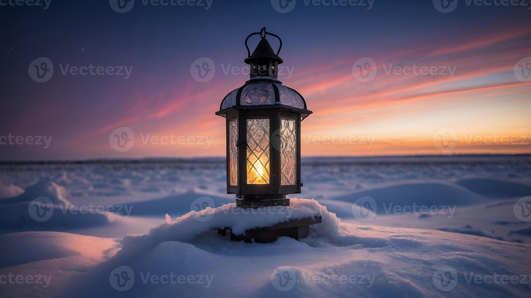 Illuminated Lantern in Snowy Winter Landscape photo