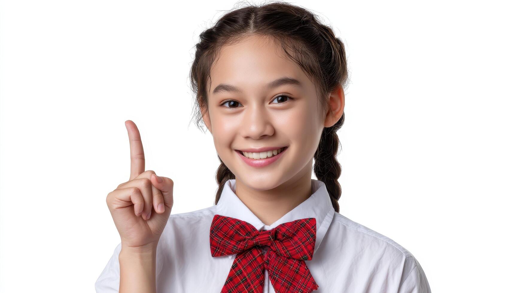 Student enthusiasm young girl with braids smiling and pointing classroom portrait positive environment photo