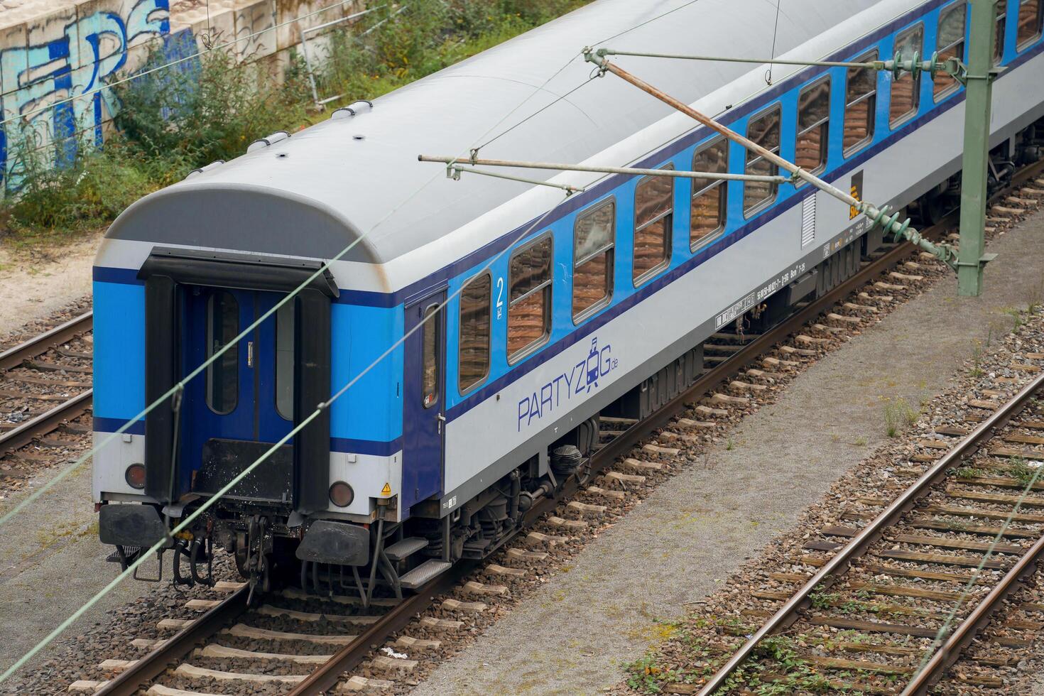 Stuttgart, Germany, 12 November 2024. The blue train carriage is on the siding. Stuttgart's party and fun train. photo