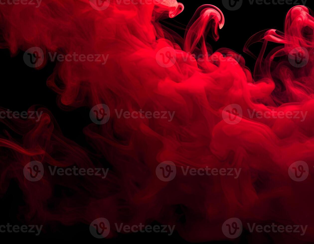 Red Smoke Swirling on Black Background for Abstract Design and Atmospheric Effects photo
