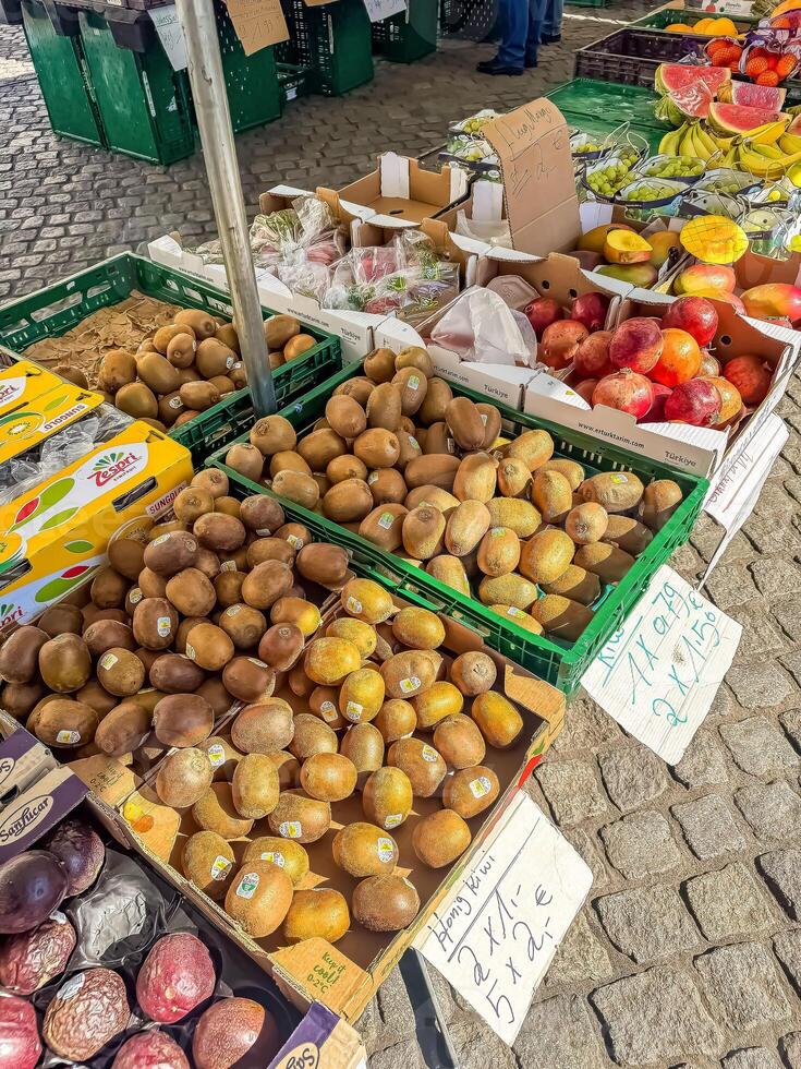 Fresh Kiwi Fruits at Outdoor Market Stall, Healthy Food, Local Produce. High quality photo