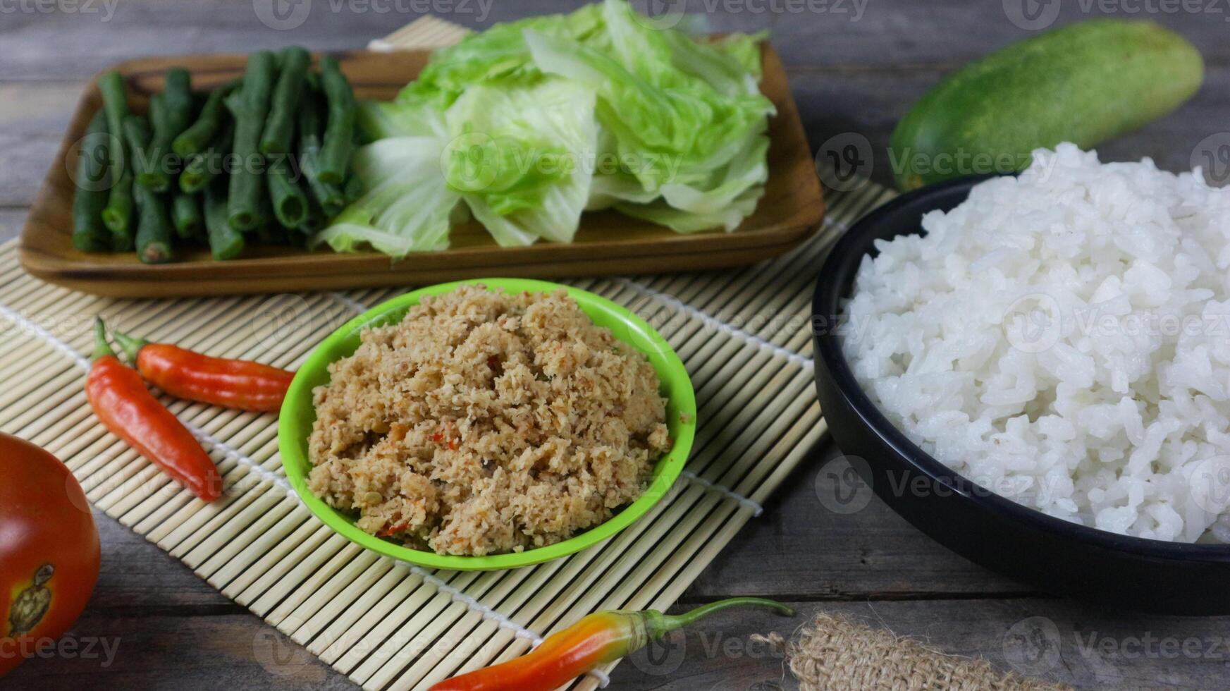urapan is vegetable mix with grated coconut and sauce. Urapan is traditional cuisine from java food photo