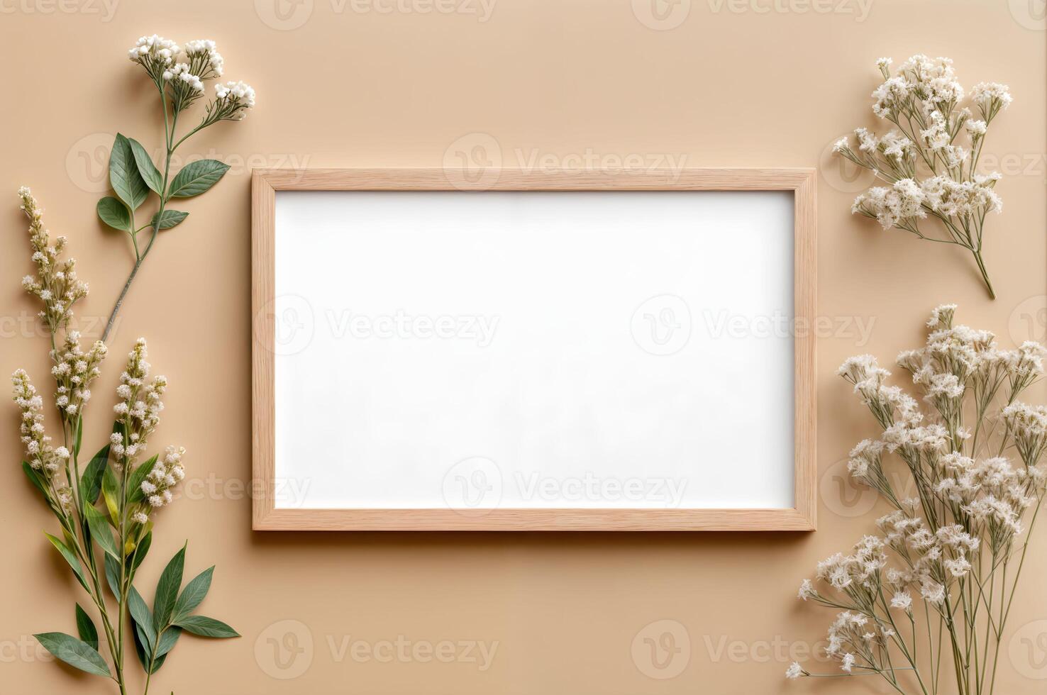 Natural decor arrangement featuring a blank frame for mockup and dried flowers on a beige background ideal for wall art mockup. photo