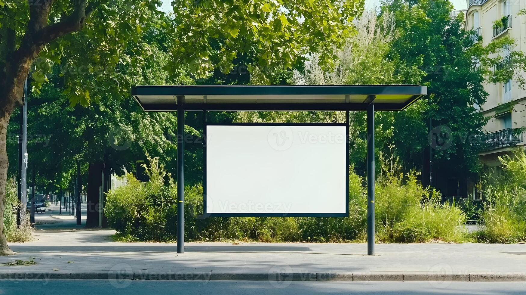 Bus stop shelter surrounded by greenery on a sunny day in a quiet urban area with a blank advertisement board for potential promotion opportunities photo
