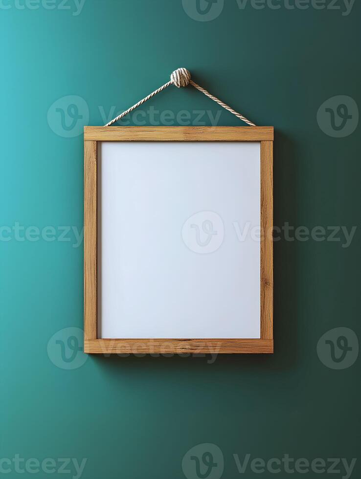Blank frame for wall art mockup showcasing a modern design set against a teal background, ideal for adding personalized artwork or decor for interior spaces photo
