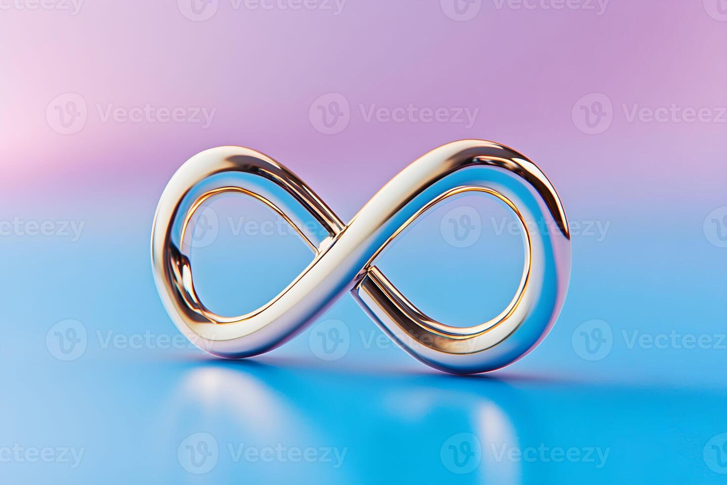 Stylish golden infinity symbol on a colorful gradient background representing limitless potential and eternity photo