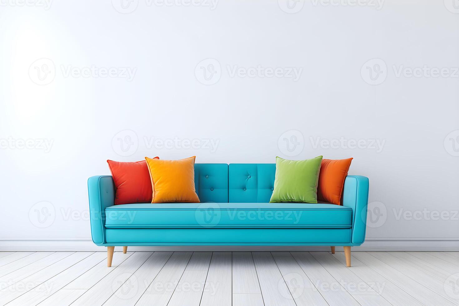 Bright turquoise sofa with colorful pillows against an empty, blank wall providing ample copy space for decoration or text photo