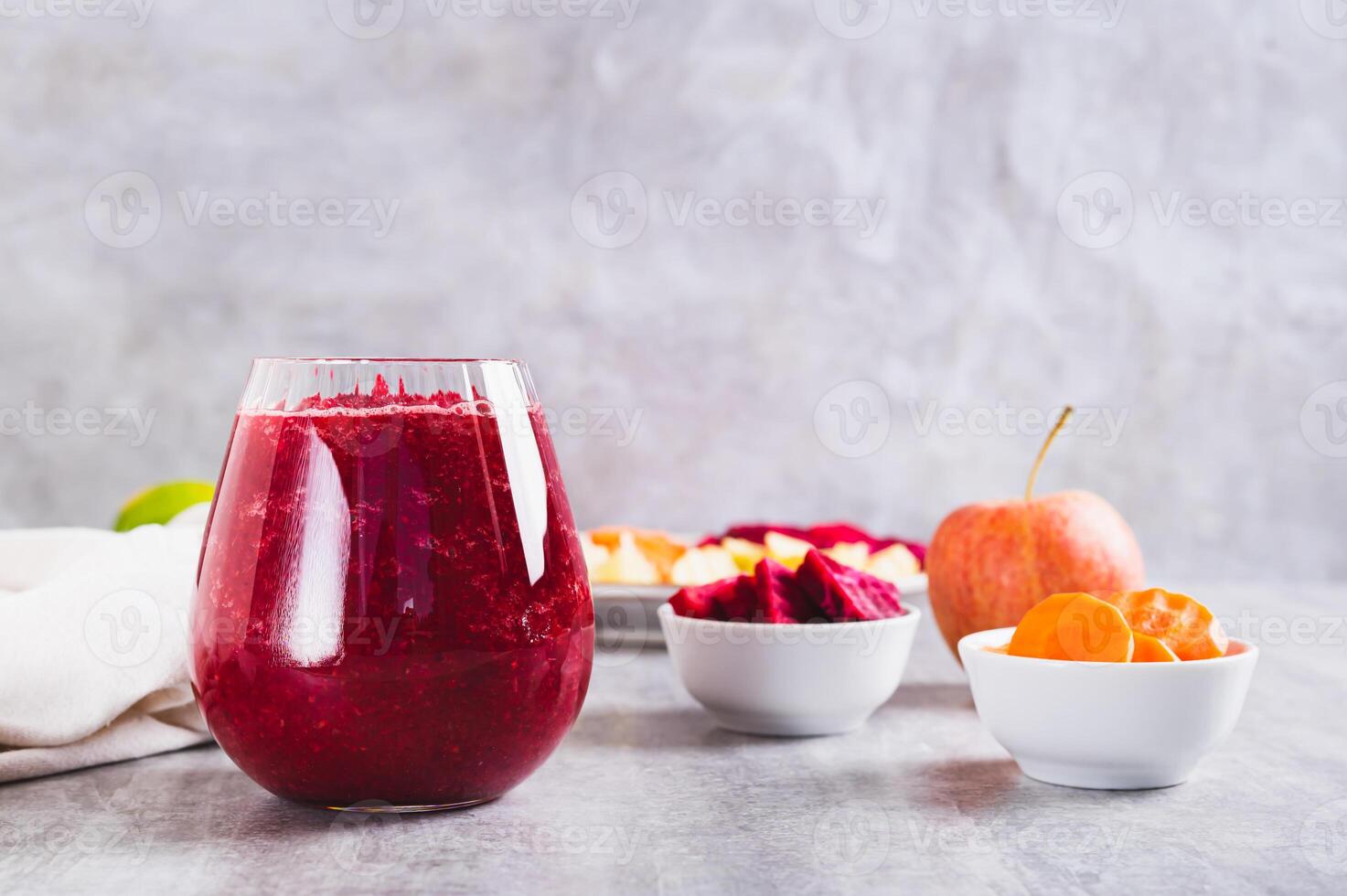 ABC juice from beetroot, carrot and apple for detox in a glass on the table photo