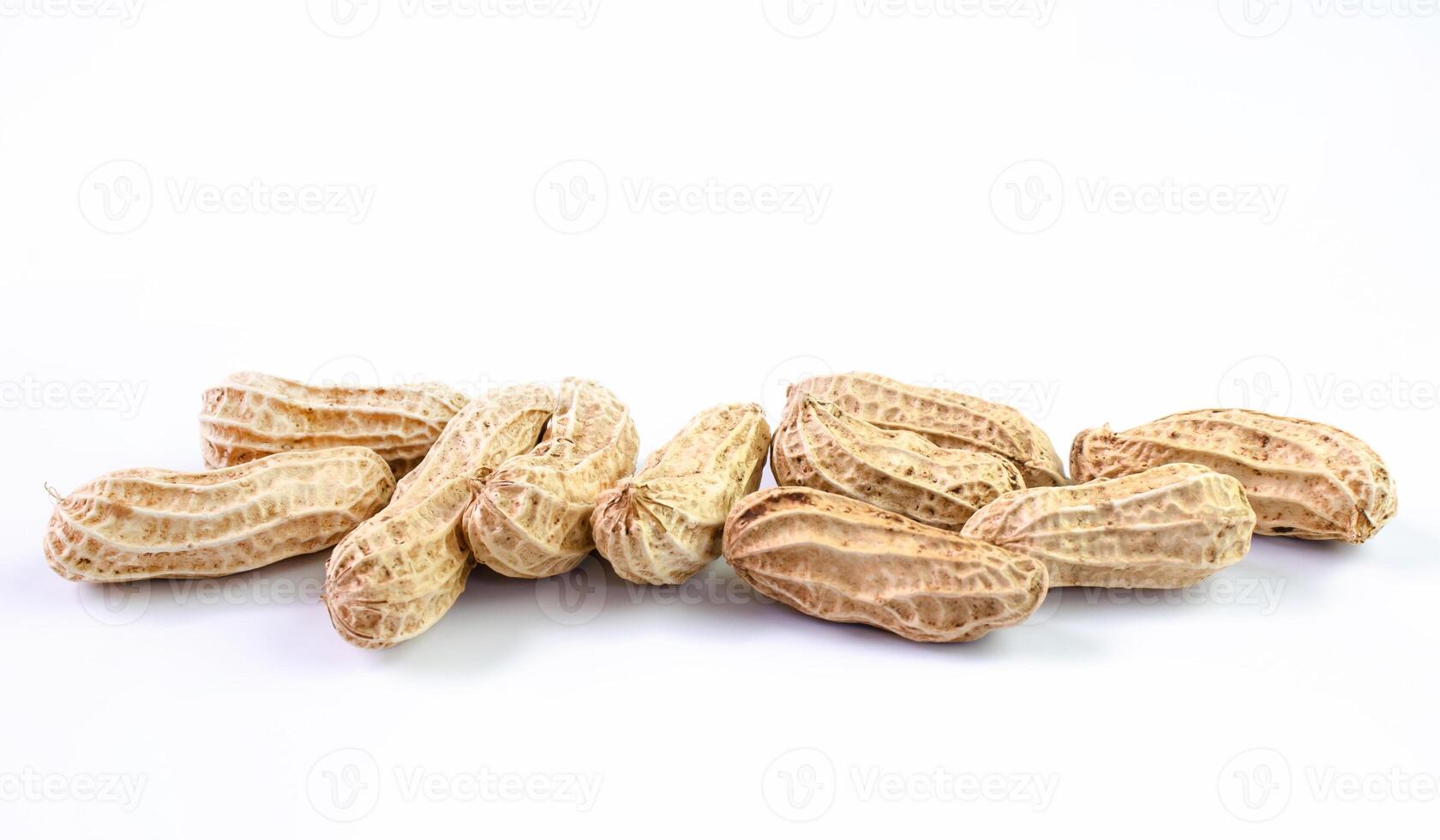peanut, dried groundnuts, monkey nut on white background photo