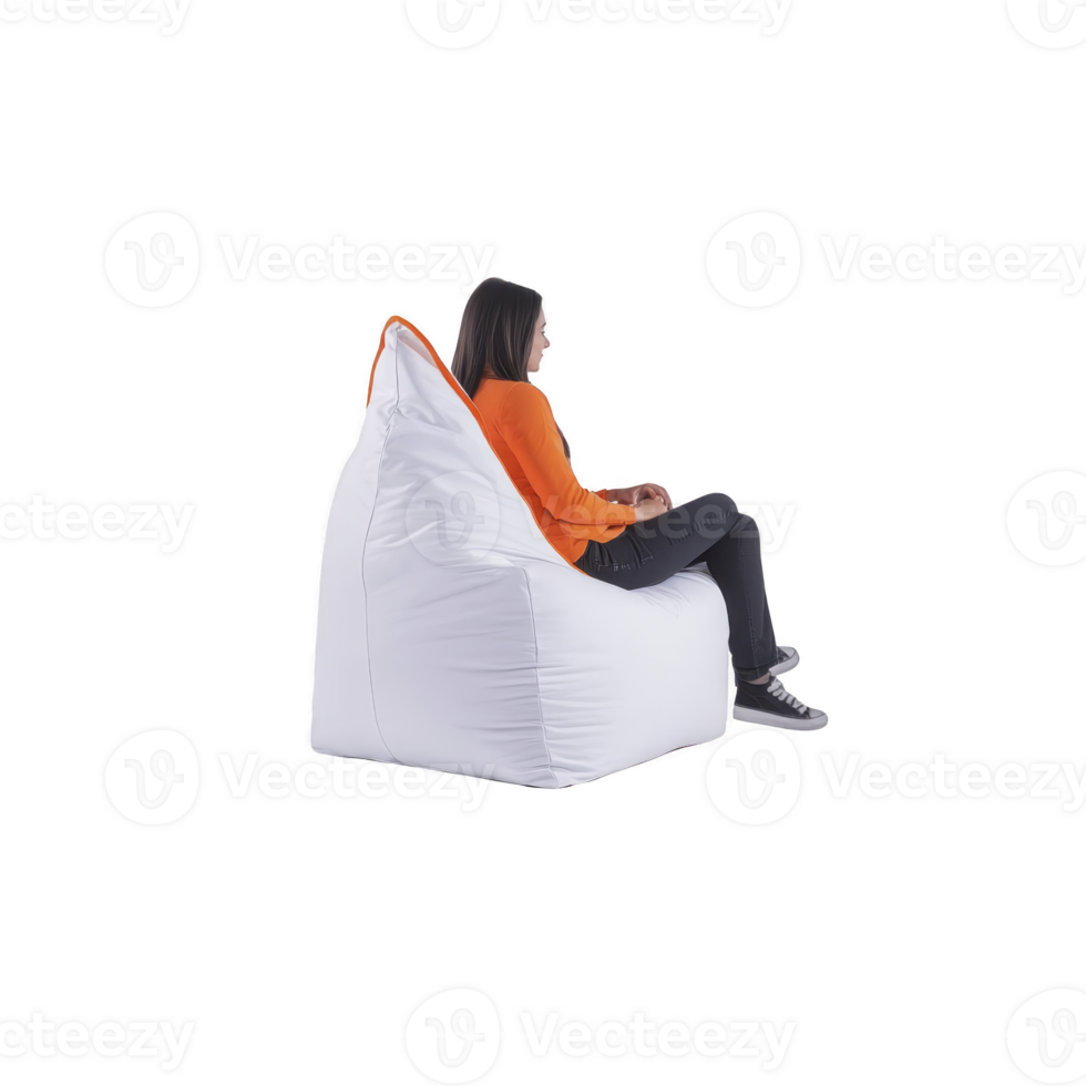 A person in orange shirt sits comfortably on large white bean bag chair, using laptop. relaxed posture and casual attire suggest cozy and informal setting, ideal for leisure or remote work png