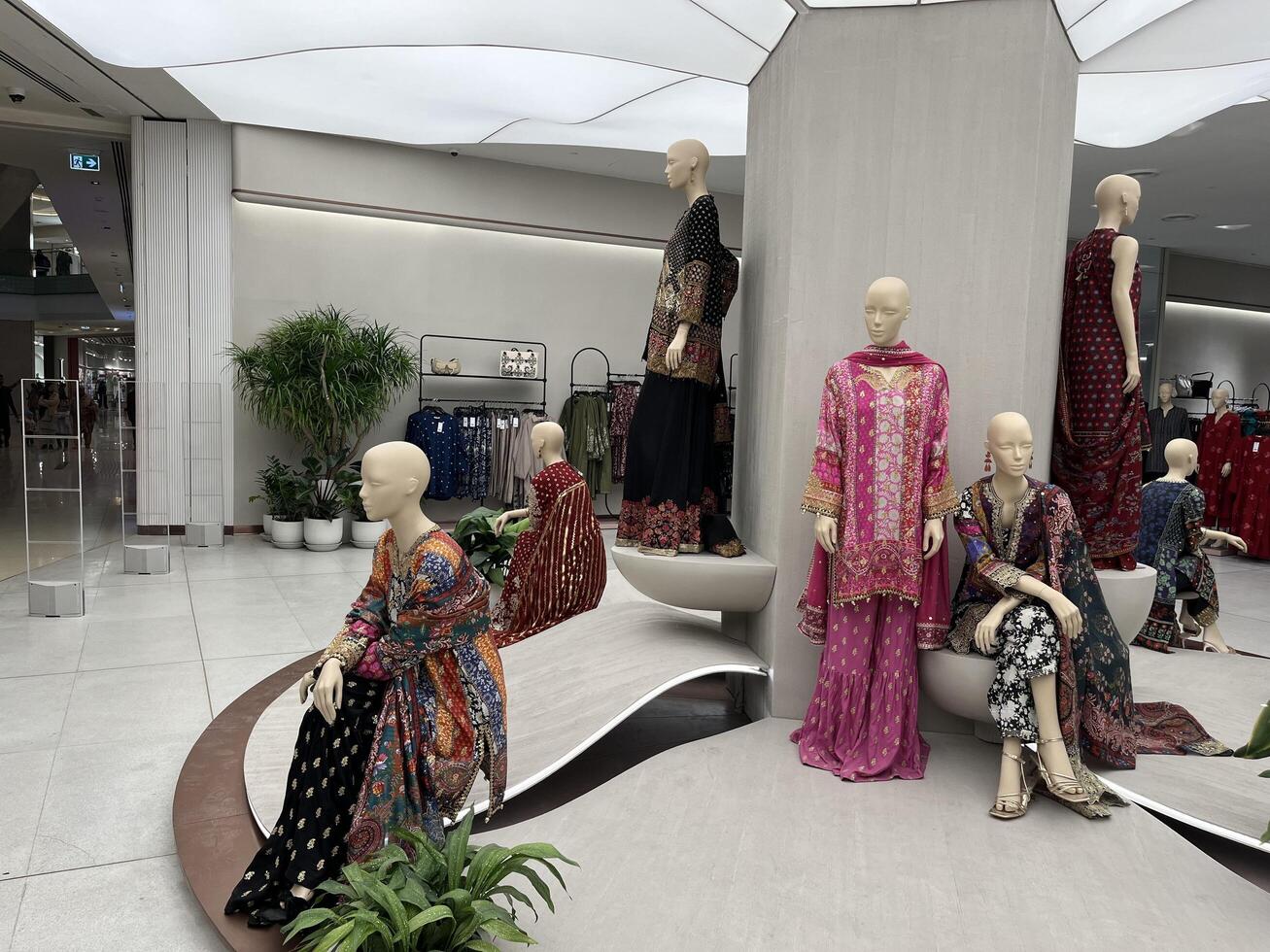 mannequins in a store with a large display of clothing in Lahore, Pakistan on January 4, 2025. photo