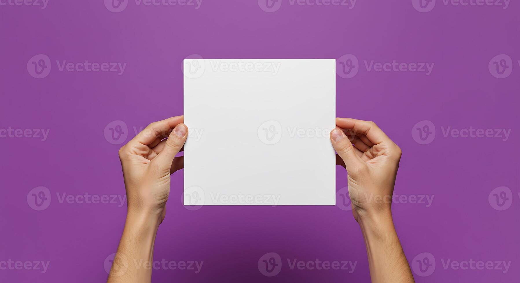Holding Blank White Card Against Purple Background for Mockup photo