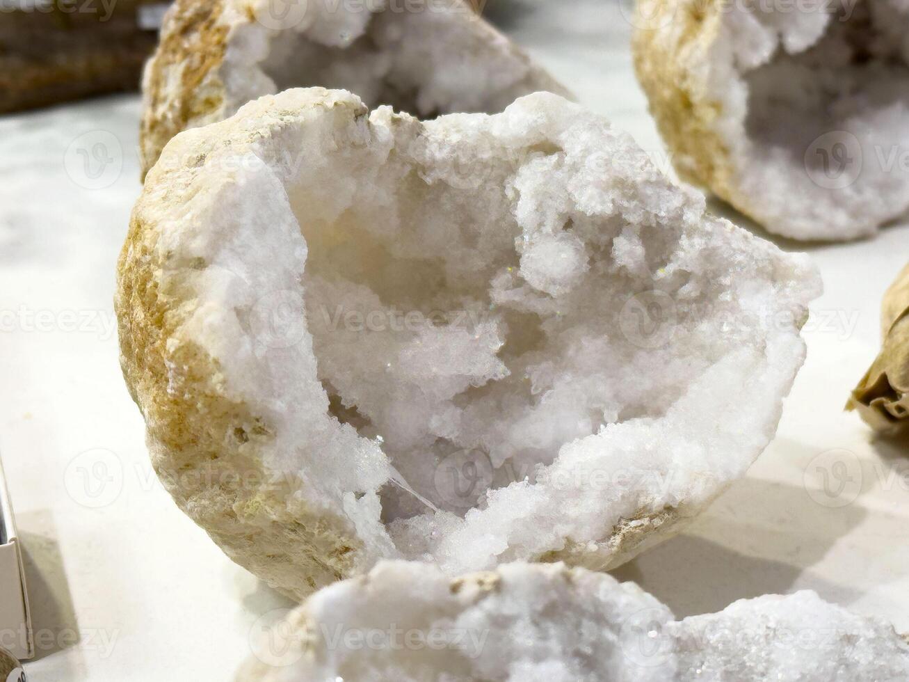 Sparkling quartz geode display with rough stone texture photo