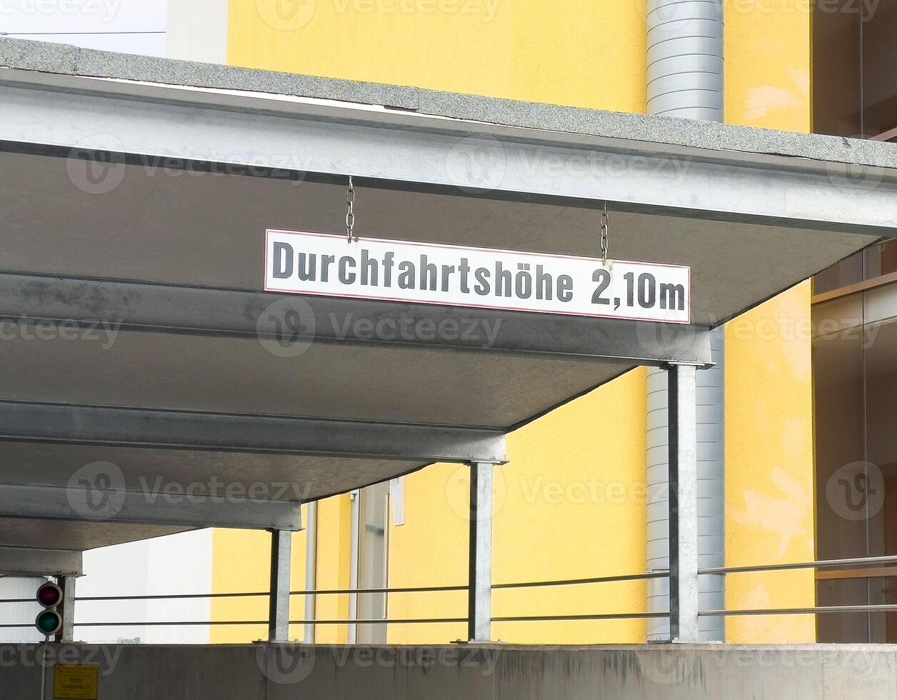 German clearance height sign in urban setting with modern architecture photo